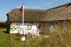 reetgedecktes Fischerhaus in Kandestederne